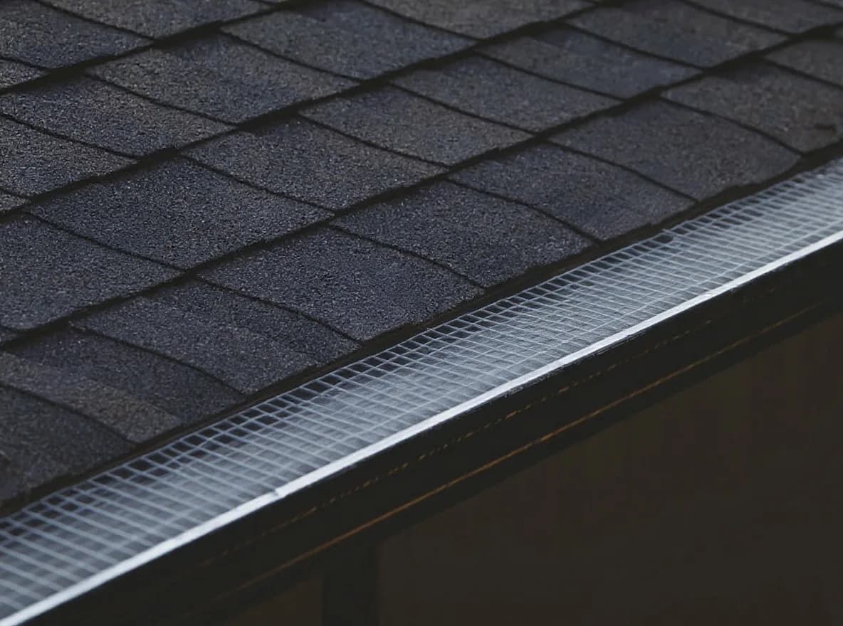 Clean gutter line with mesh guard after install