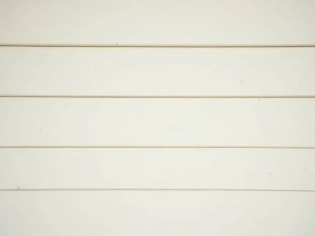 Clean white lap siding in close detail